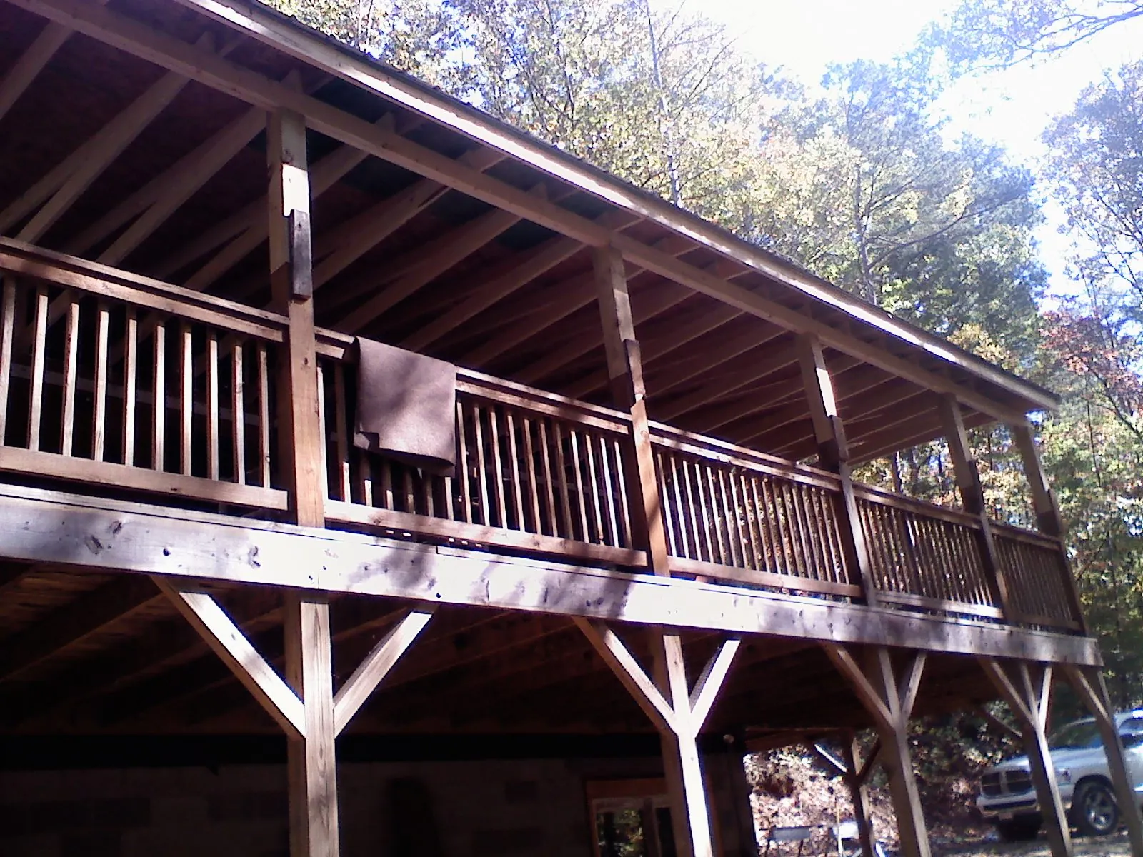 Timber framing under a new elevated porch and deck in Jackson
